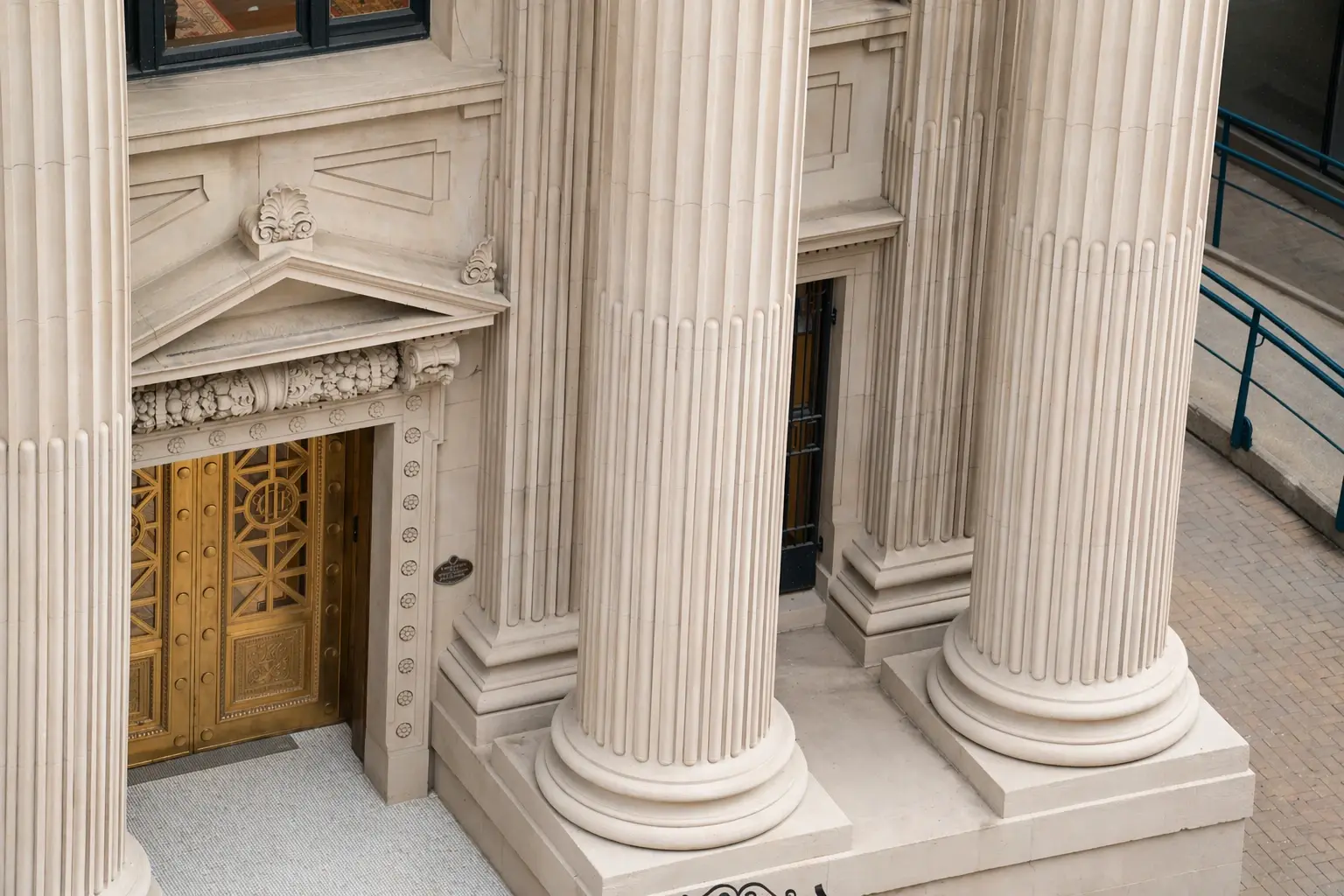 Classical building entrance with ornate columns 1