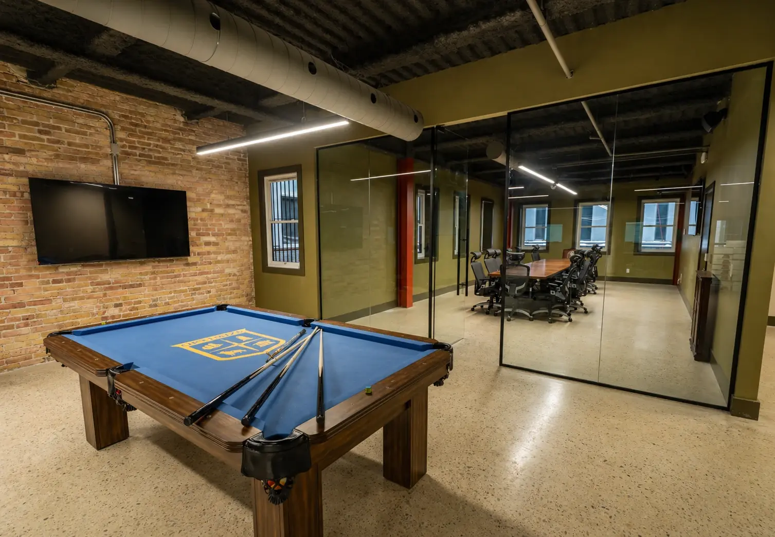 Industrial office with pool table and conference room 1