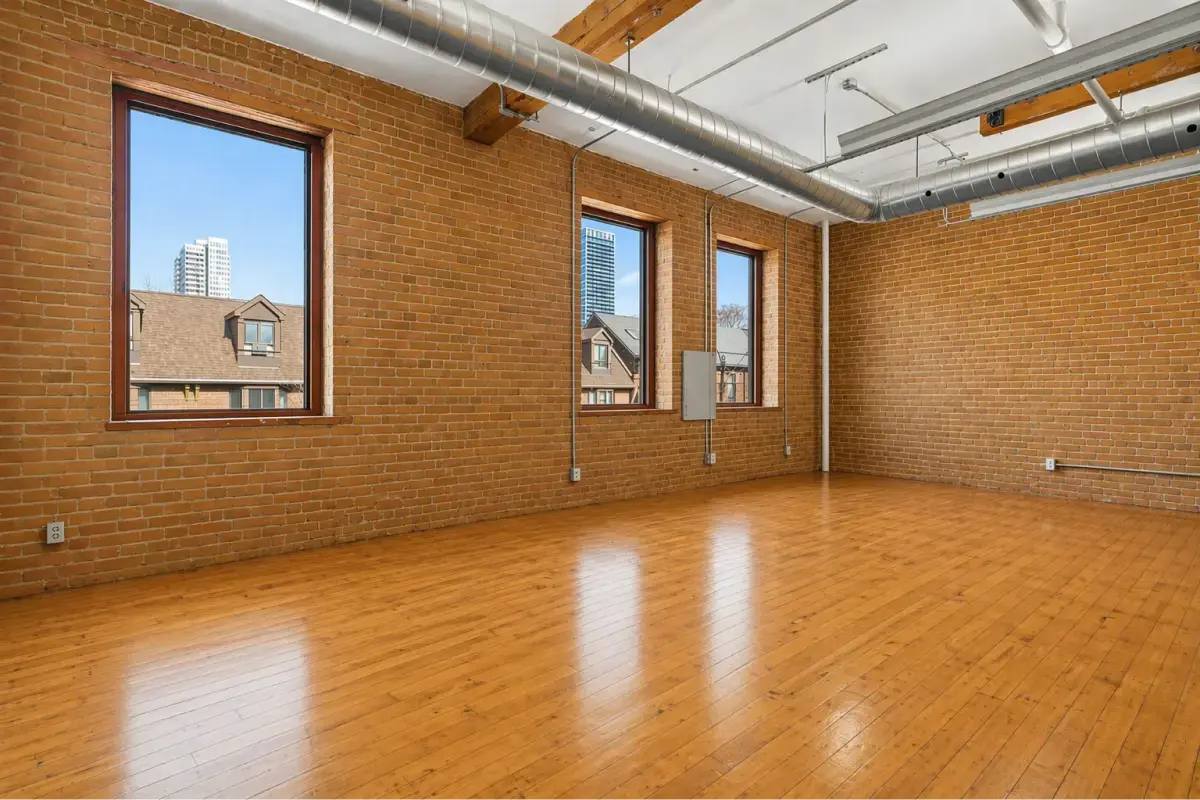 Industrial loft with wood floors and city views