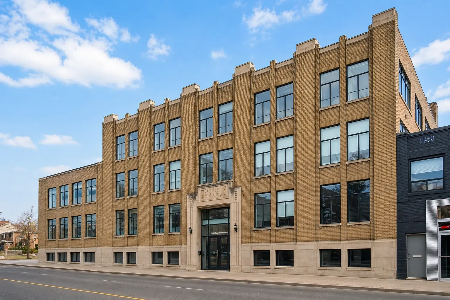 Historic brick building on quiet street 1